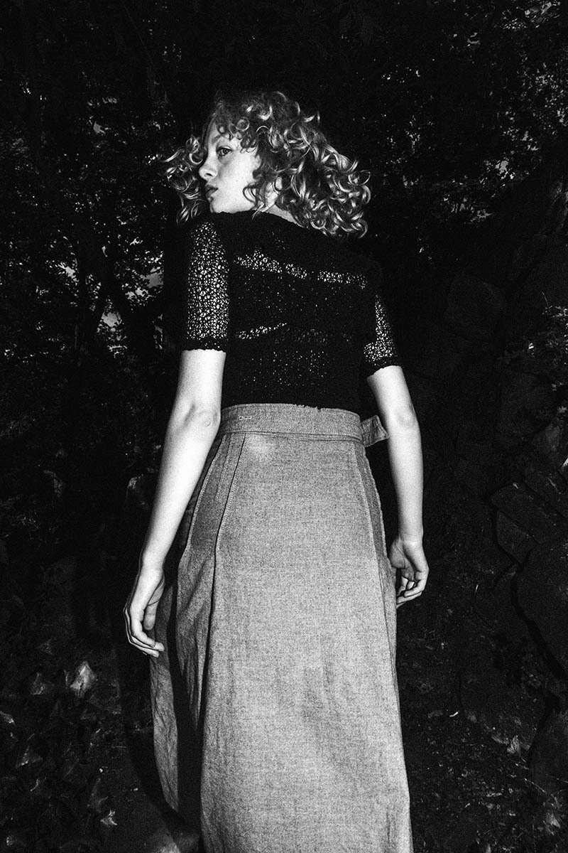 woman in black & white, captured during movement